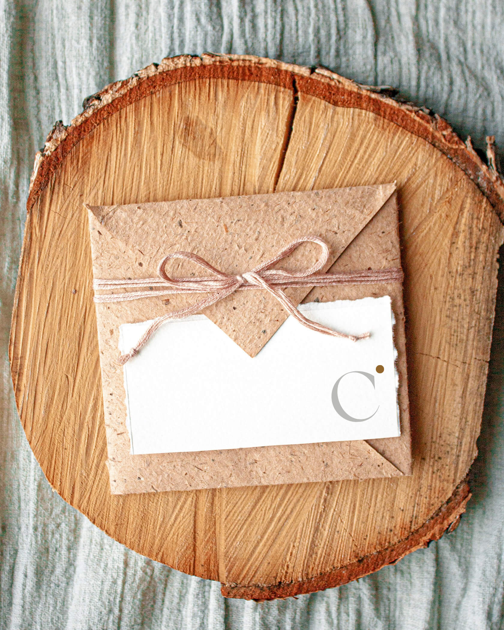 Hotel voucher on a slice of a tree - Hotel Continental