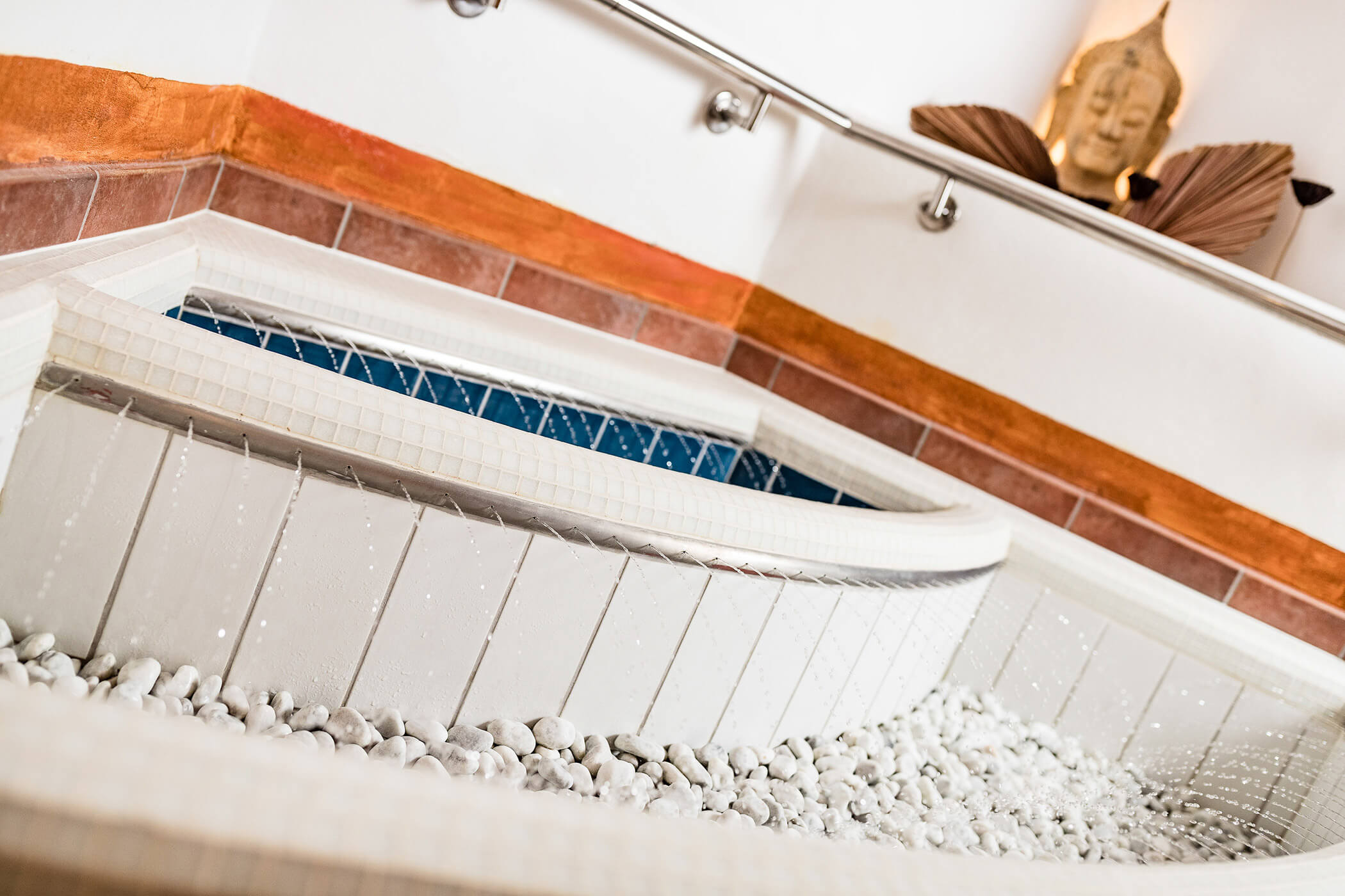 Kneipp pool at the Hotel Continental with Buddha statue in the background
