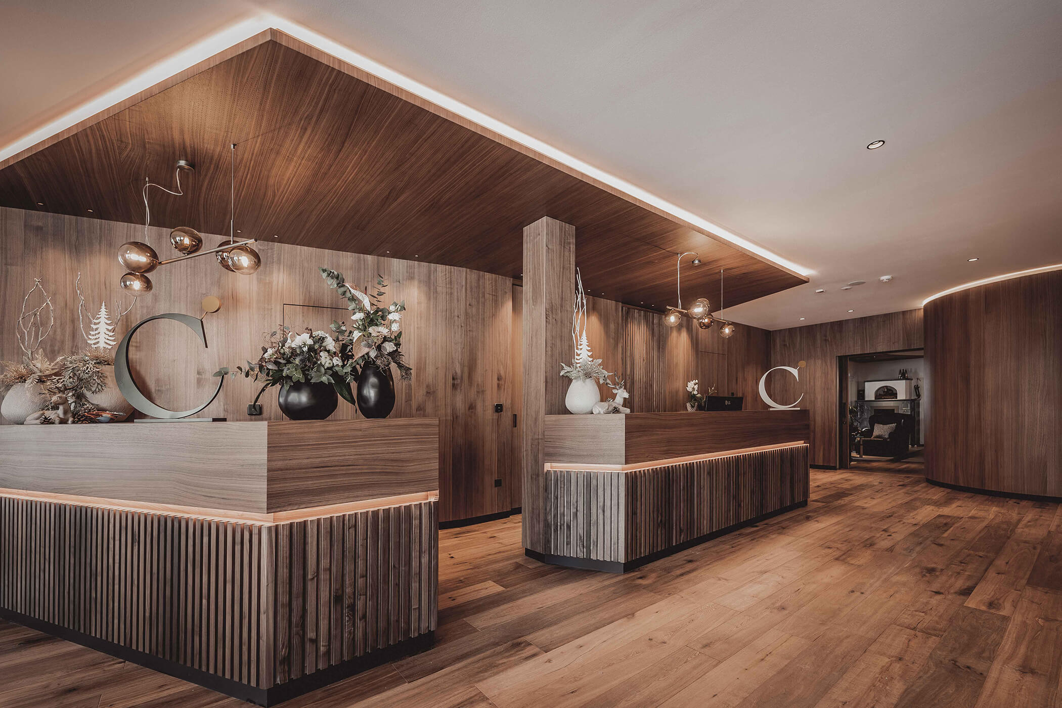 Bright wooden reception desk at the Hotel Continental