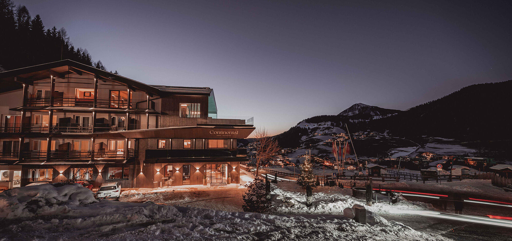 The Hotel Continental in Selva di Gardena from the outside in the evening