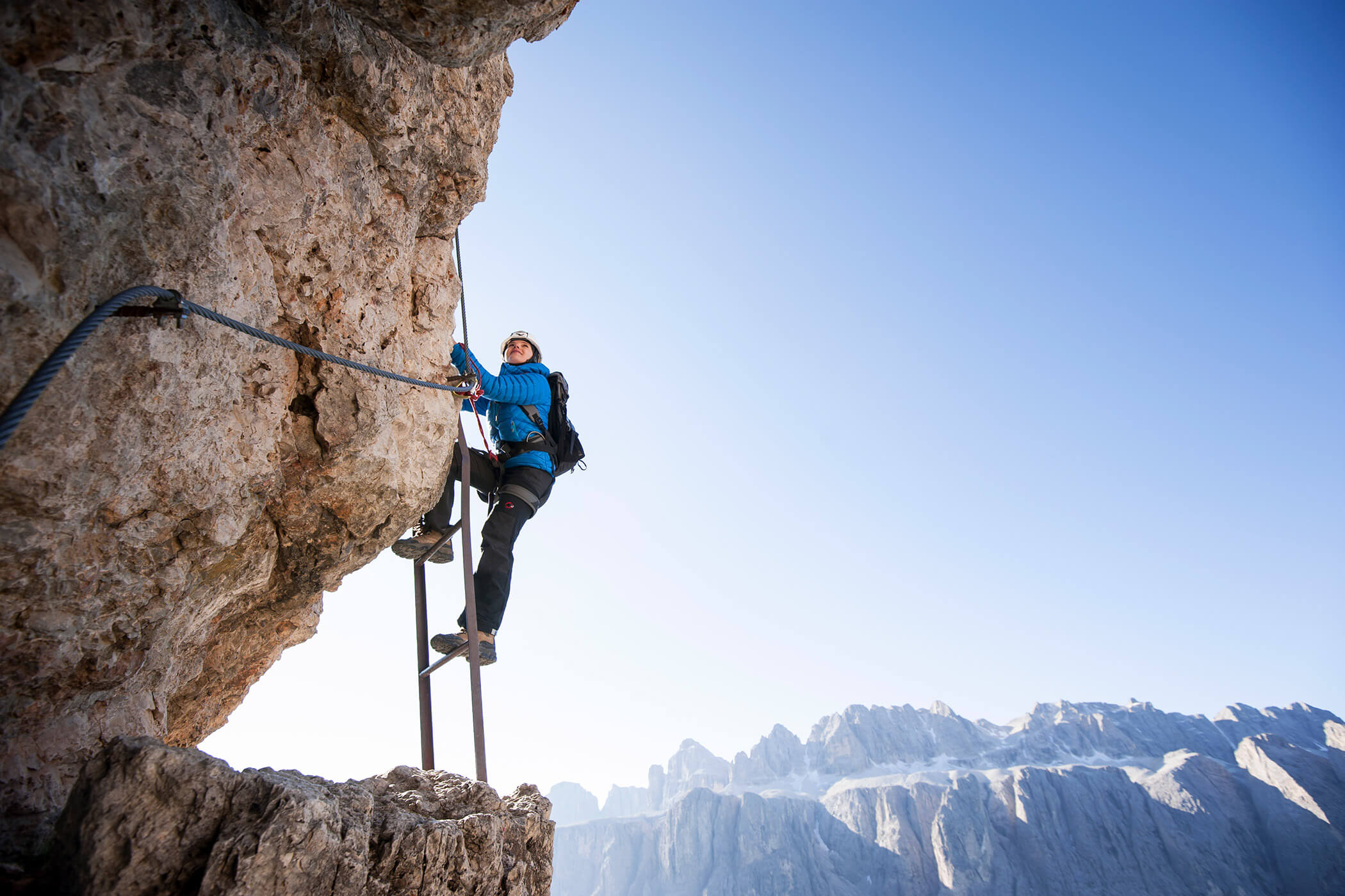 Woman on the via ferrata in Val Gardena - Hotel Continental