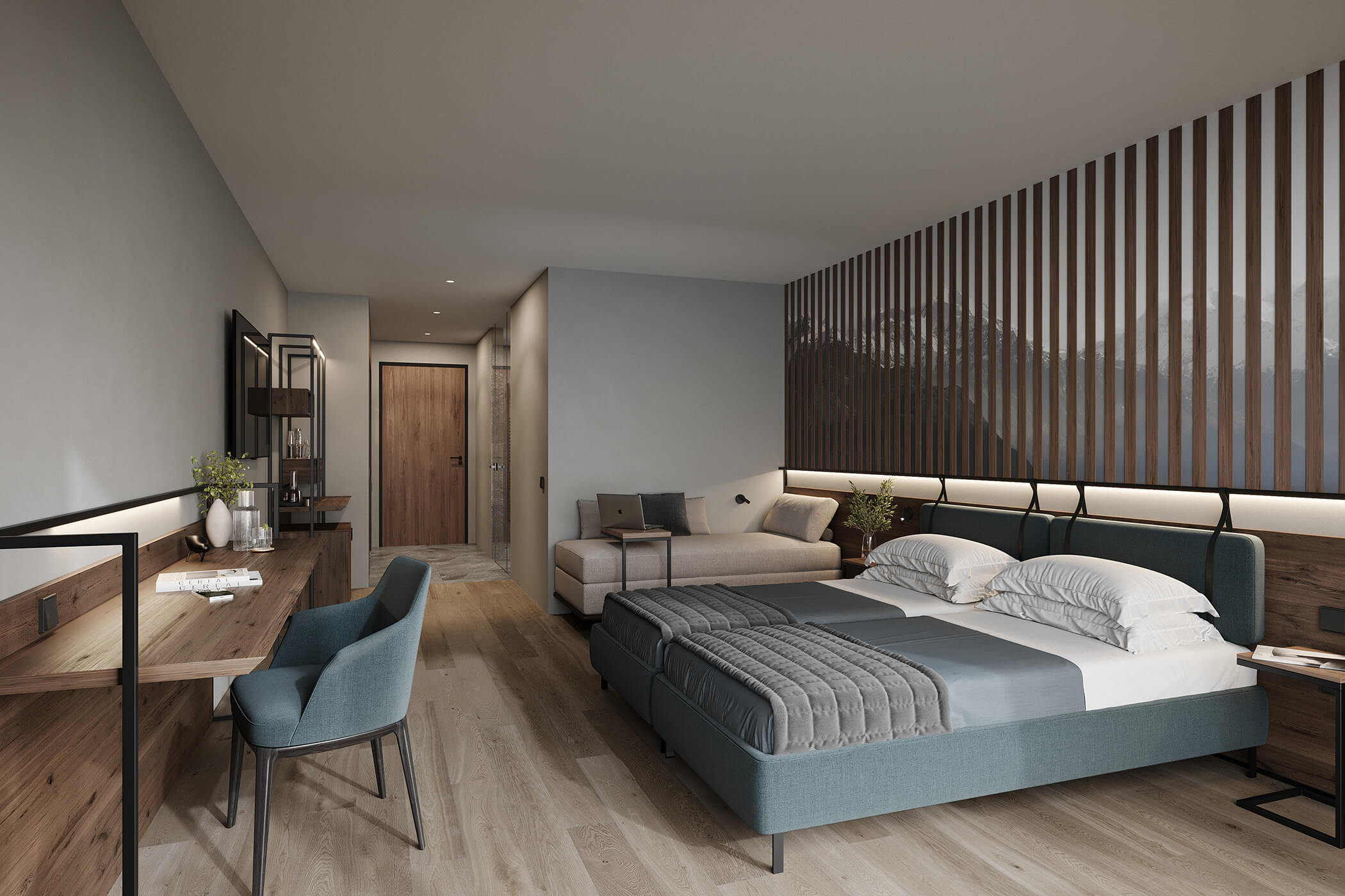 Stevia hotel room with blue double bed, desk and sofa - Hotel Continental